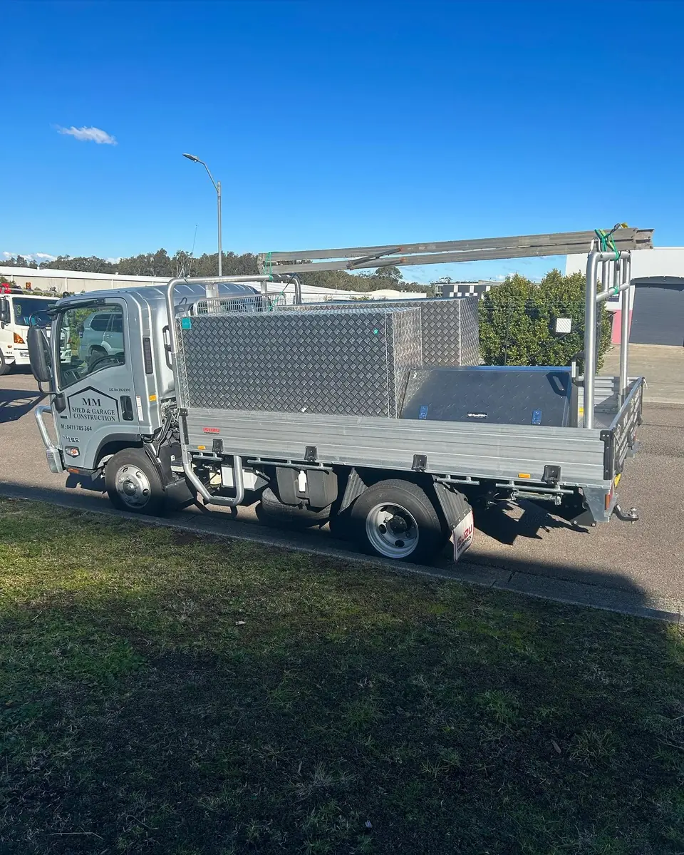 Commercial flatbed vehicle parked outdoors