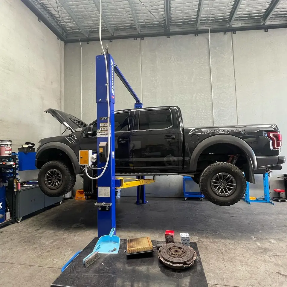 Pickup truck on a workshop vehicle lift